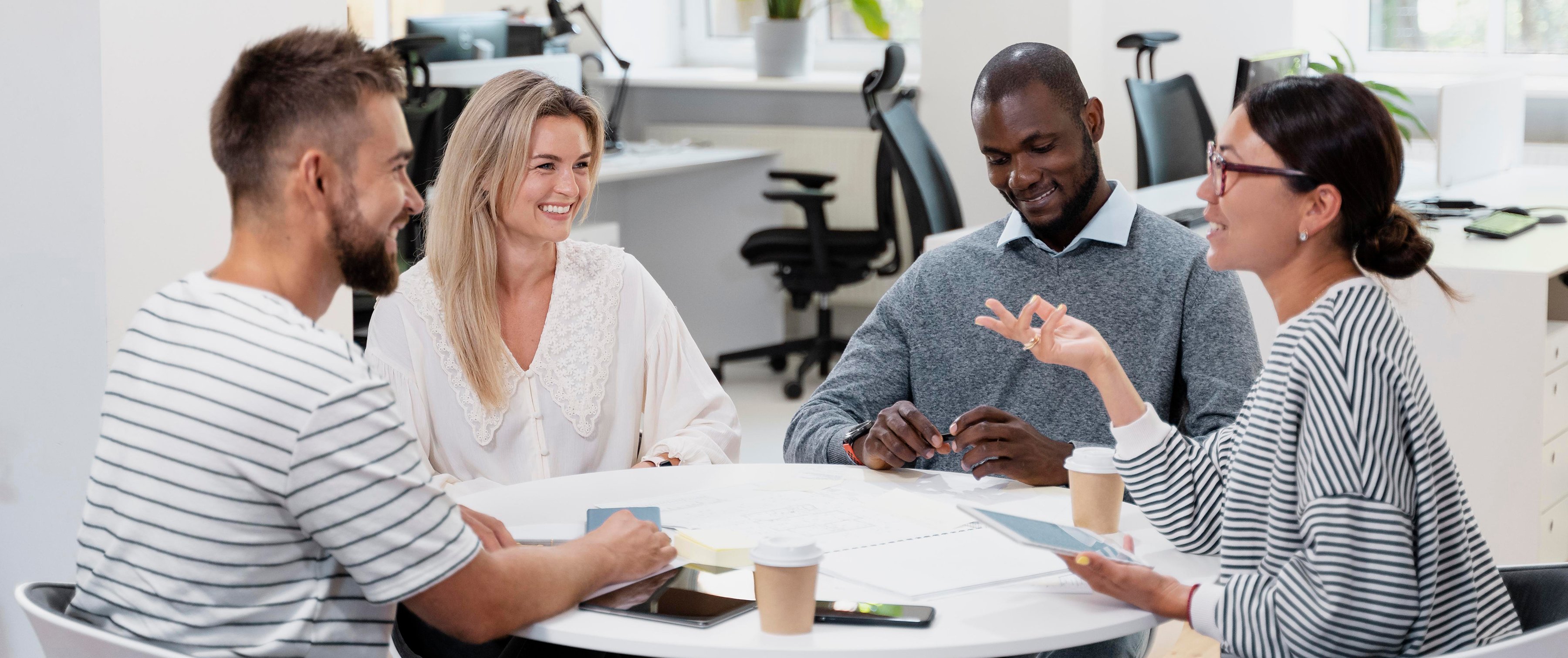 close-up-young-colleagues-having-meeting-1